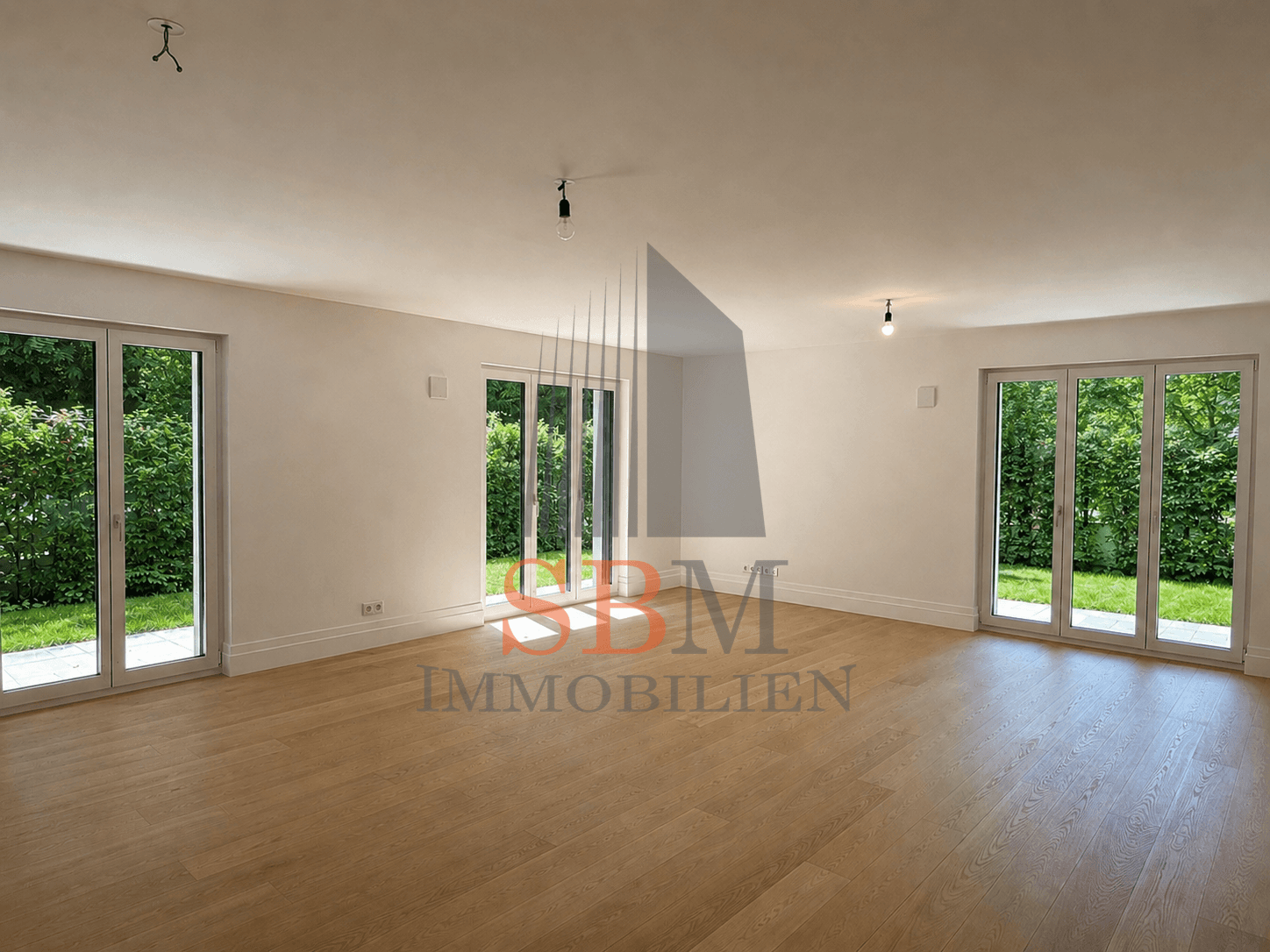 Ein Solitär! Der Zenit des Wohnens: hochkarätige 3-Zi.-Gartenwohnung in Alt-Bogenhausen - Wohnzimmer